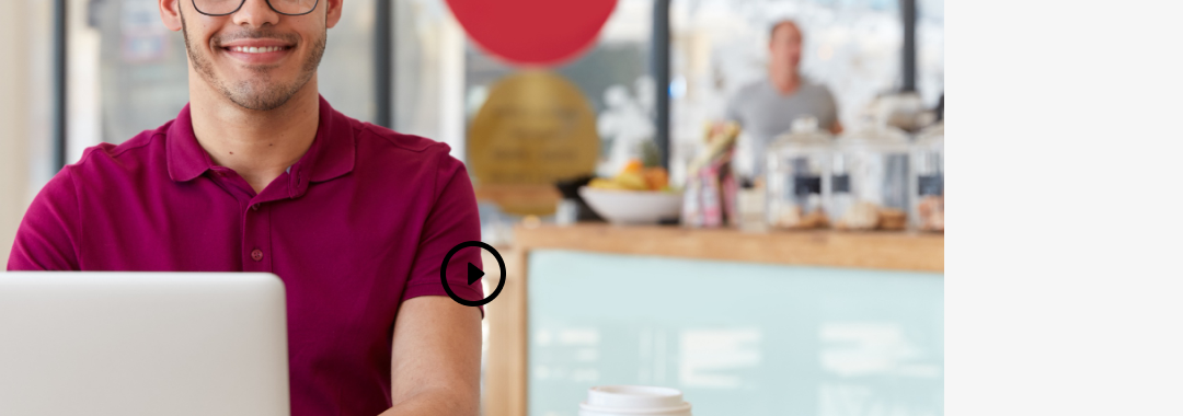 Team member working on a laptop